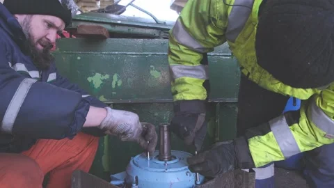 Engineers fix and repair winch electric motor on tanker 動画素材 130994865