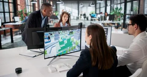 Engineers On GIS Team Using Design Software For Mapping Land. Stock Photos