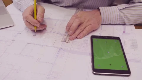 The engineer's hand correcting the drawing Video stock 84678505