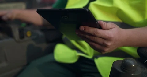 The engineer's hand holds the tablet and typing on it Video stock 127811819