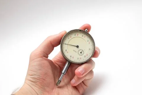 Engineer's hand with a micrometer Stock Photos
