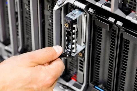Engineer's Hand Working On Server At Data Center Stock Photos