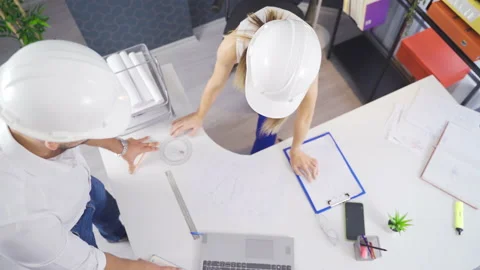 Engineers hold meeting on drawing project. Stock Footage 219685631