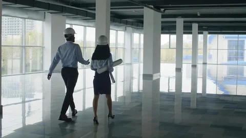 Engineers inspecting new object Video stock 125713151