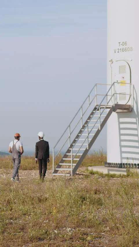 Engineers Inspecting Wind Turbine Stock Footage 318644282