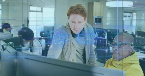 Engineers leaning and pointing at code while technology overlay animating nodes Stock Footage 315599811