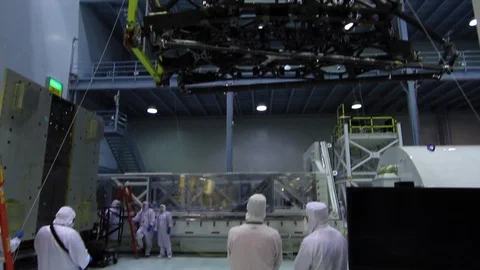 Engineers lifted Webb Telescopes Structure and Slowly placing it down - 2016 Stock Footage 112132800