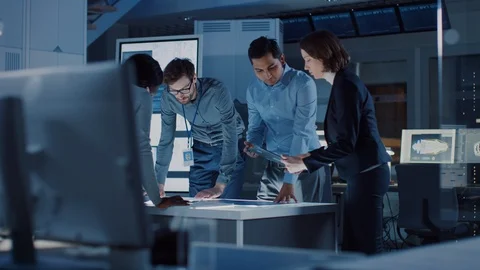 Engineers Meeting in Technology Research Laboratory: Engineers, Scientists Video stock 104800299