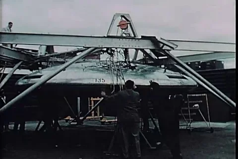 Engineers modifying the control system of avrocar - 1960 Stock Footage 101162439