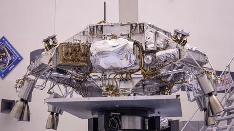 Engineers perform mass properties testing on the rocket-powered descent sta.. Stock Photos