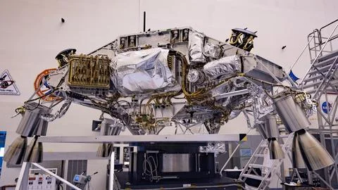 Engineers perform mass properties testing on the rocket-powered descent sta.. Stock Photos