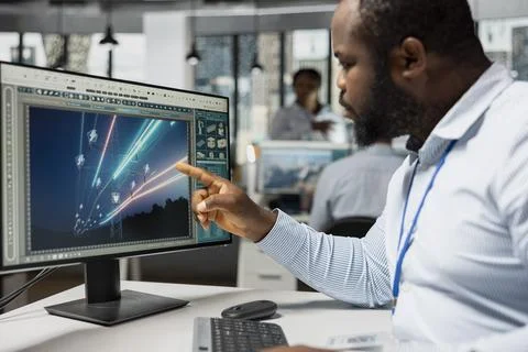 Engineers refines transmission tower systems at work, improving efficiency Stock Photos