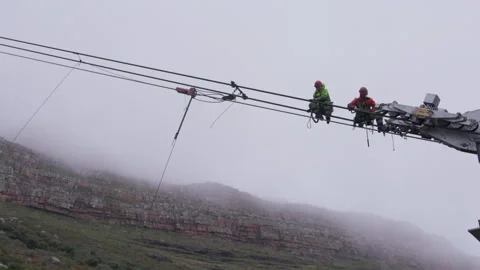 Engineers repairing the Table Mountain aerial cableway cable Stock Footage 242015486