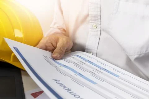 Engineers review project documentation and management. Stock Photos