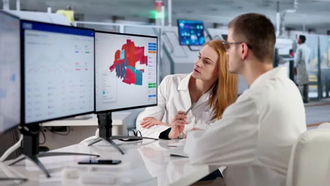 Engineers Reviewing 3D Cad Design On Computer Stock Footage 333396654