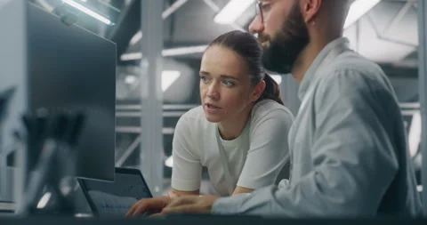 Engineers Reviewing Network Performance Data Stock Footage 325422045