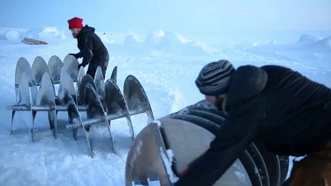 Engineers rolling drill bits across snow at Ice Camp Skate, Arctic Circle Stock Footage 87063796