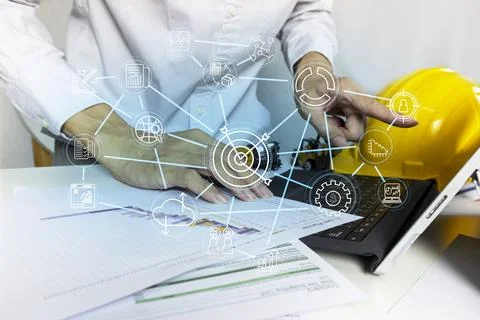 Engineers setting work goals and project management, connecting production .. Stock Photos
