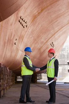 Engineers shaking hands Stock Photos
