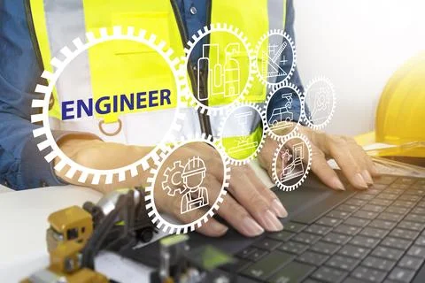 Engineers sit and work on building design and system work.,construction wor.. Fotos de archivo