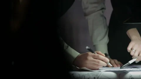 Engineers study blueprints, 2 clips Stock Footage 45174659