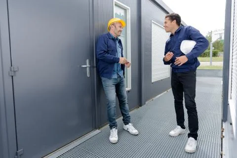 The engineers talking outside office Stock Photos