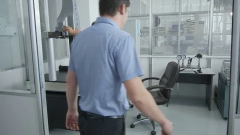 Engineers Test Modern Meters with Computer Program Stock Footage 78426747