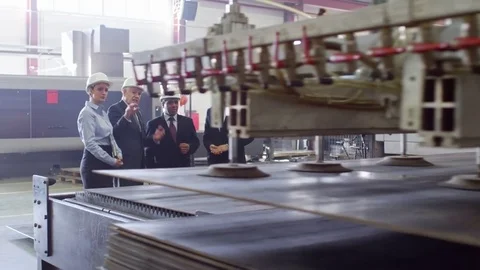 Engineers Testing Machine at Factory Stock Footage 76950800