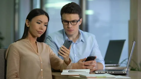 Engineers testing new smartphone, disappointed with software quality, test group Stock Footage 102901178