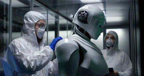 Engineers testing on robot controls Stock Footage 101656900