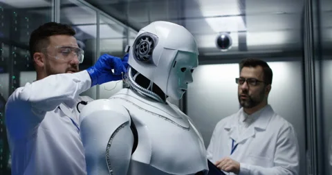 Engineers testing on robot controls Stock Footage 101657248
