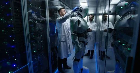 Engineers testing on robot controls Foto stock