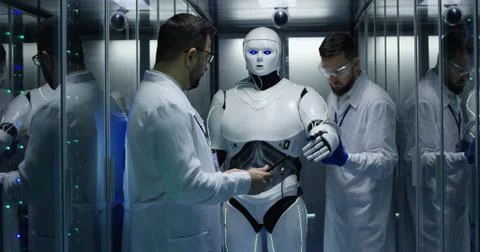 Engineers testing on robot controls Foto stock
