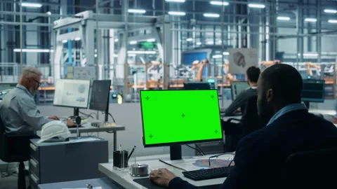 Engineers Use Green Screen Computer in Car Factory Stock Footage 159006929