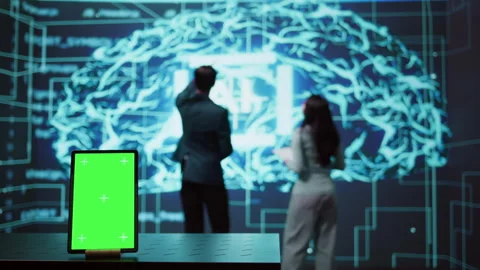 Engineers use green screen tablet and AI neural networks to look at data Stock Footage 278697754