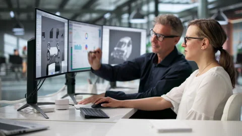 Engineers Using Computer To Create 3D Design Stock Footage 337225655