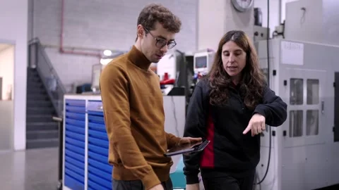 Engineers using digital tablet to check the industrial process Stock Footage 260510218