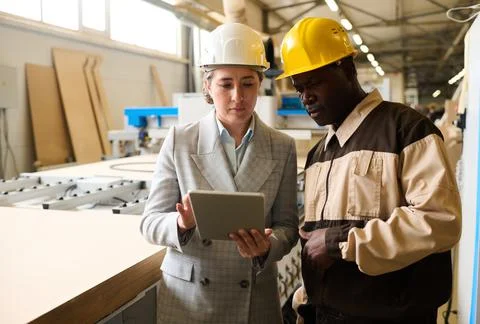 Engineers using tablet pc at work Stock Photos