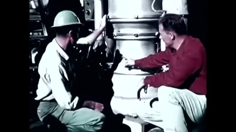 Engineers watch a rocket engine test firing during a class at the Santa Susana Stock Footage 95642686