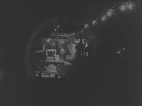 Engineers work at tunnel construction site - 1938 Stock Footage 95181199