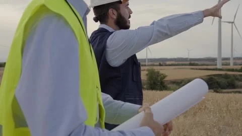 Engineers worker group wind power plant walking together for maintenance Stock Footage 256092020