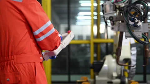 Engineers working and solving problems on machine Stock Footage 241519913