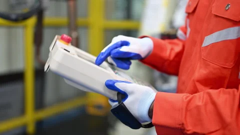 Engineers working and solving problems on machine Stock Footage 241520049