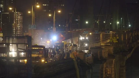 Engineers working on construction site of bridge, New York City Stock Footage 61132411