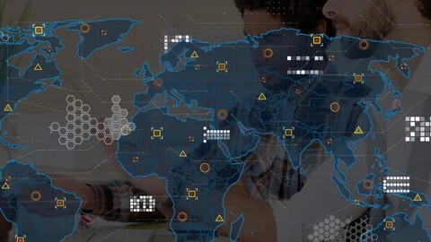 Engineers working at desk, rotating disc model while data loading and map Stock Footage 333062924