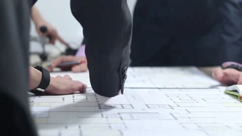 Engineers working with drawings Stock Footage 87085938
