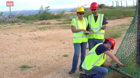 Engineers working in an industrial park Stock Footage 228501021