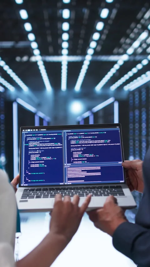 Engineers Working On Laptop Managing Servers Stock Footage 336369260