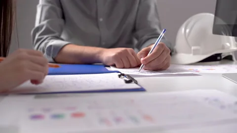 Engineers working on the project. Stock Footage 167876071