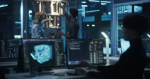 Engineers Working with Quantum Computer Stock Footage 318965159